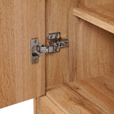 A close-up of a metal hinge on a freestanding cabinet with a walnut oak finish, highlighting the seamless connection between the light wood door and its frame, echoing mid-century modernism.