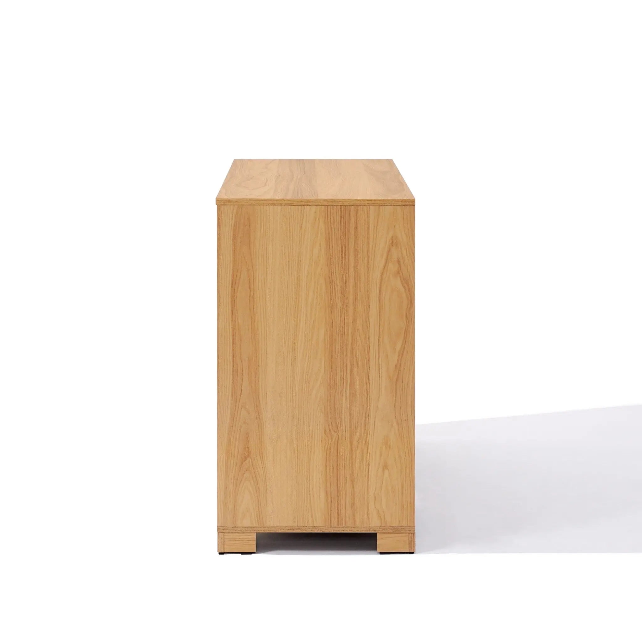 Side view of a wooden cabinet with a light wood finish on a white background, embodying minimalist design.