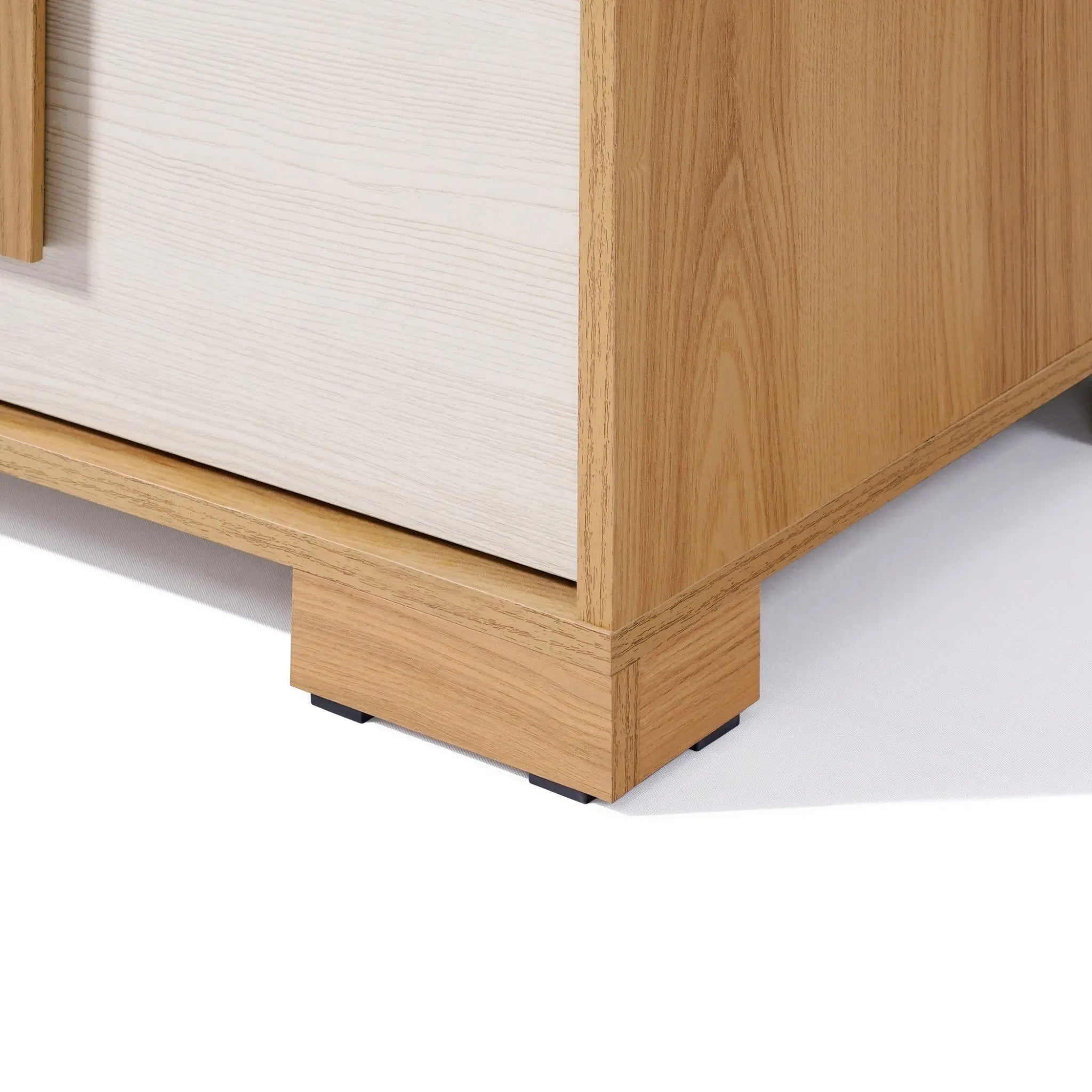 This mid-century modern dresser features a wooden corner with a striking light and dark wood grain finish, complemented by a rectangular base that exudes minimalist design.