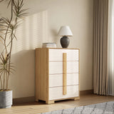 A mid-century modern design wooden dresser with a vertical handle stands beside a tall plant. A lamp and two books are on top. Sunlight filters through curtains, casting shadows on the wall and floor—a stylish storage solution for any room.