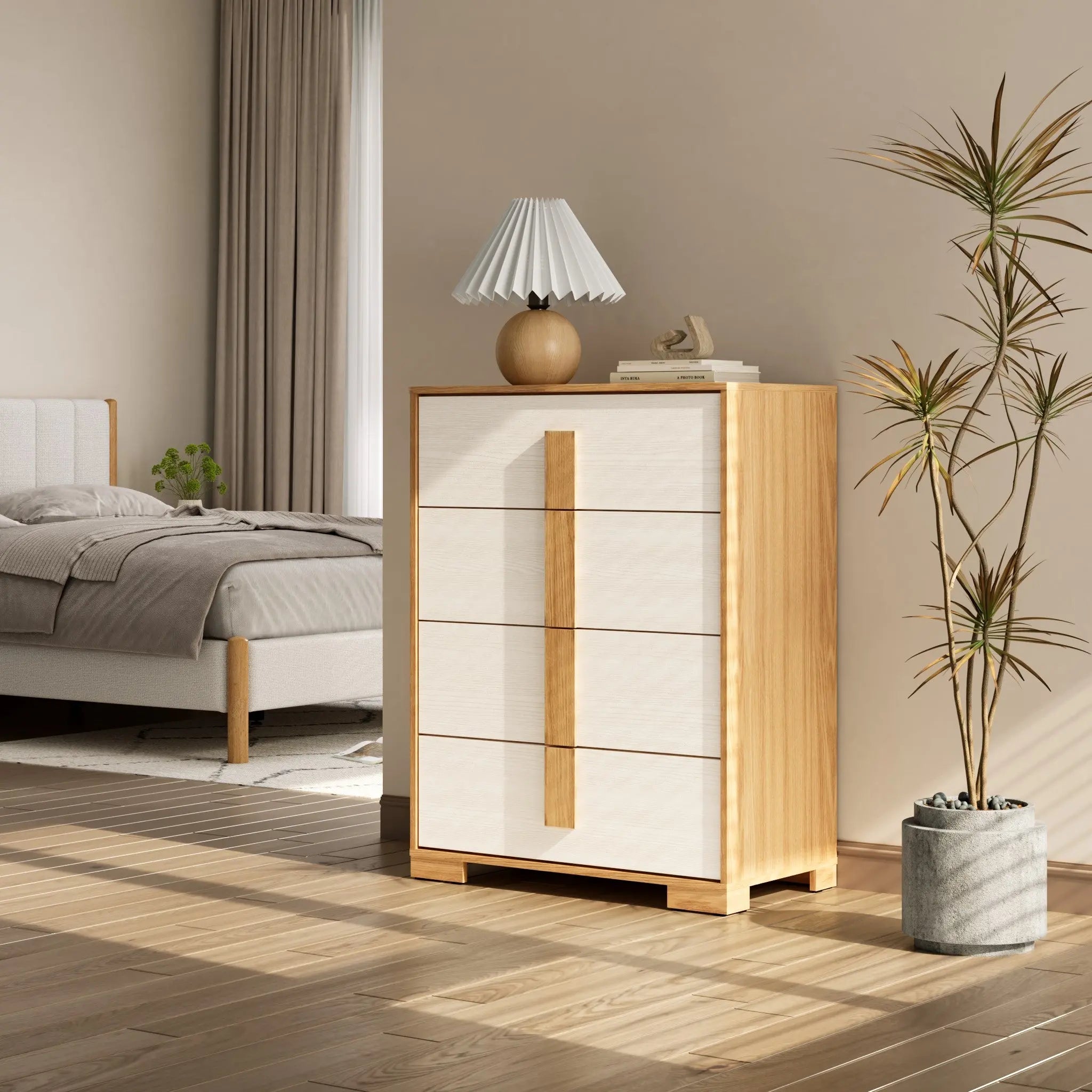 A modern bedroom features a light wooden dresser with a mid-century modern design, bed, tall plant, and small lamp and books on the dresser. This sleek 4-drawer chest serves as an ideal storage solution while natural light casts gentle shadows on the floor.