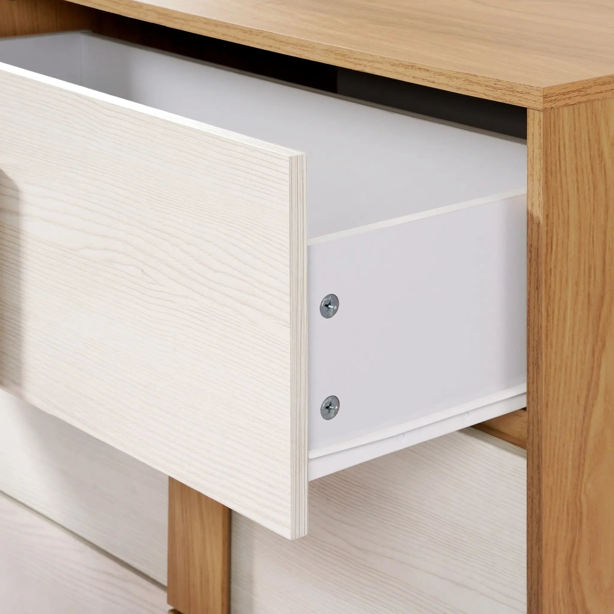 A mid-century modern design wooden dresser with an open drawer reveals a pristine white interior, offering both style and a practical storage solution.