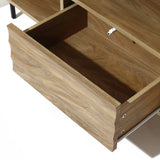 Open wooden drawer with visible wood grain, crafted in mid-century modern style, attached to a cabinet. The warm, light walnut-colored wood adds elegance, while the discreet cable management hole ensures functionality without compromising aesthetics.