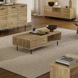A living room adorned with mid-century modern wooden furniture, featuring a stylish coffee table on a beige rug. Decor includes a wooden bowl, trays, books, and vases. Neutral-colored curtains and a lamp complete the serene backdrop.