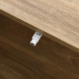 A close-up of a wooden surface on a mid-century modern coffee table showcases a small white plastic latch neatly attached to the side.