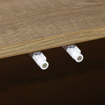 Close-up of two white shelf pegs protruding from a wooden board, perfectly complementing the mid-century modern aesthetic.