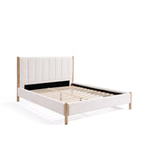 A beige upholstered queen-sized white boucle bed frame showcases a vertical stripe design on the headboard and wooden legs, viewed from a three-quarter angle.