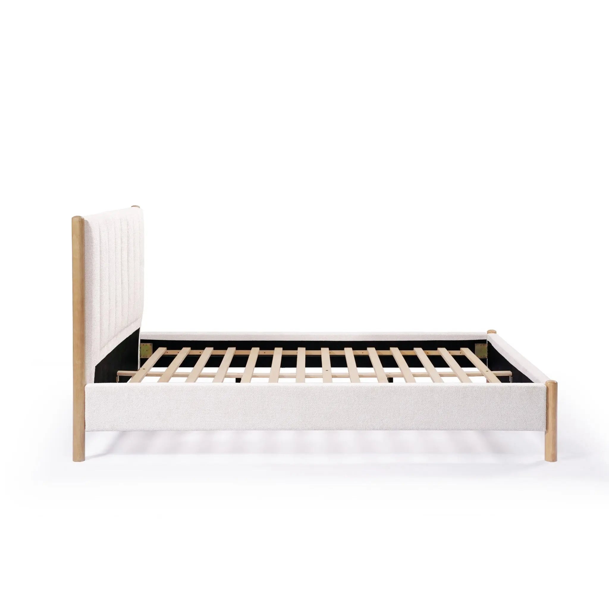 Side view of a rubberwood platform bed with a light upholstered queen-sized white boucle headboard, featuring a slatted base and no mattress, placed against a plain background.