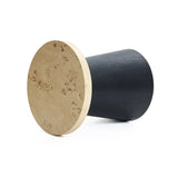 A modern, two-toned cylindrical stool with a tree burl texture lies on its side, showcasing a light, textured wooden top and a smooth, dark base. Perfect as a side table or seating option with lightweight MDF construction for easy mobility.