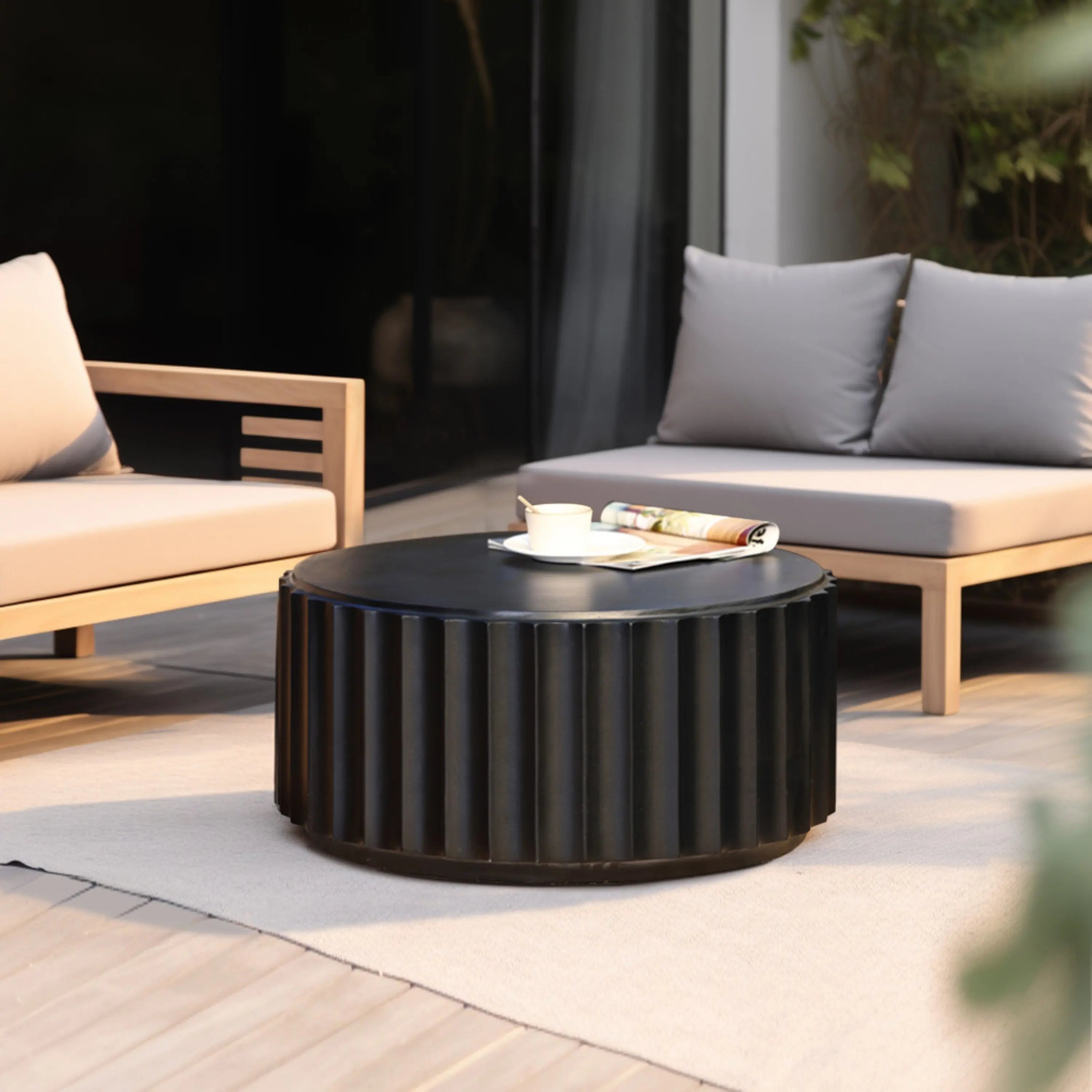 black coffee-table-and-two-chairs-on-a-patio