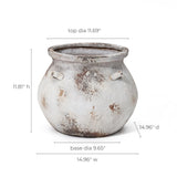 The LuxenHome Antique Cauldron Planter is a round ceramic pot with a weathered white and brown finish and two small handles. Made from magnesium oxide, it measures 11.81 H x 14.96 W/D, with a top diameter of 11.69 and base diameter of 9.65.