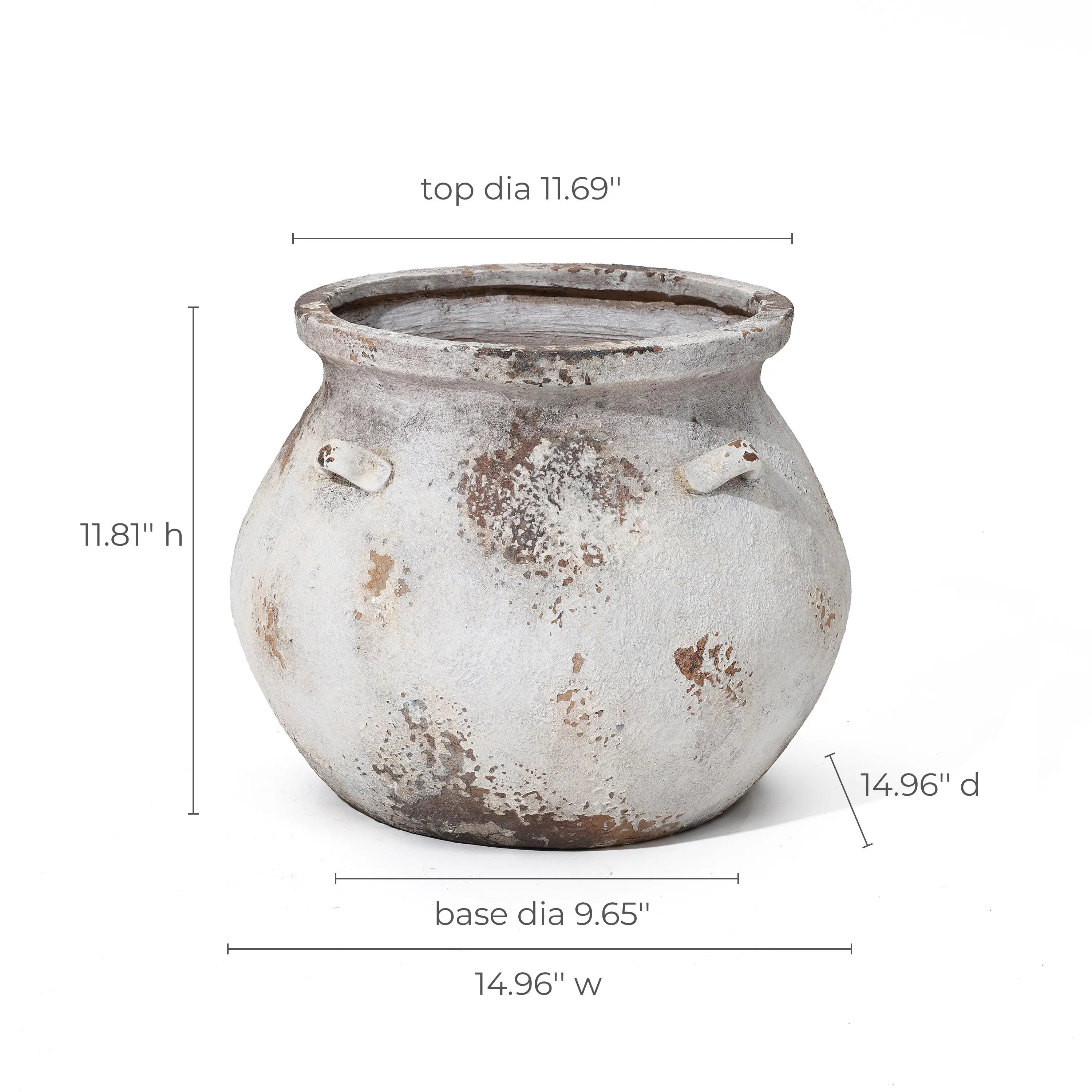 The LuxenHome Antique Cauldron Planter is a round ceramic pot with a weathered white and brown finish and two small handles. Made from magnesium oxide, it measures 11.81 H x 14.96 W/D, with a top diameter of 11.69 and base diameter of 9.65.