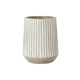 A beige ceramic vase with vertical white ridges, this weather-resistant planter adds a touch of elegance to any space.