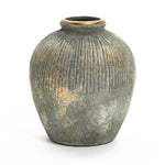 The LuxenHome rustic gold and brown terracotta bud vase, standing 8.7 high, features a textured ribbed pattern and distressed finish that creates an antique look. Its rounded body and narrow top add rustic charm to any home decor.