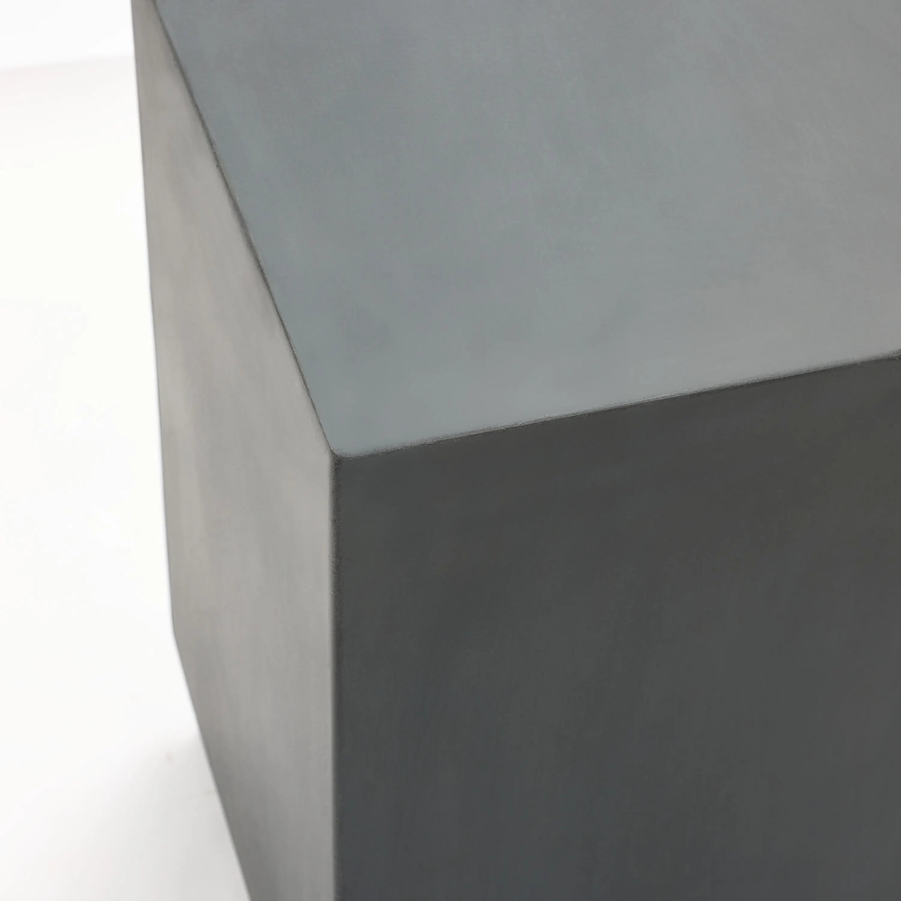 A-close-up-of-a-sleek-metallic-grey-cube
