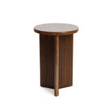 Round wooden table with a vertically slatted cylindrical base and smooth, high-quality MDF wood tabletop, embodying mid-century modern design.