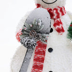 playful-snowman-holding-small-shovel-Christmas-decorations