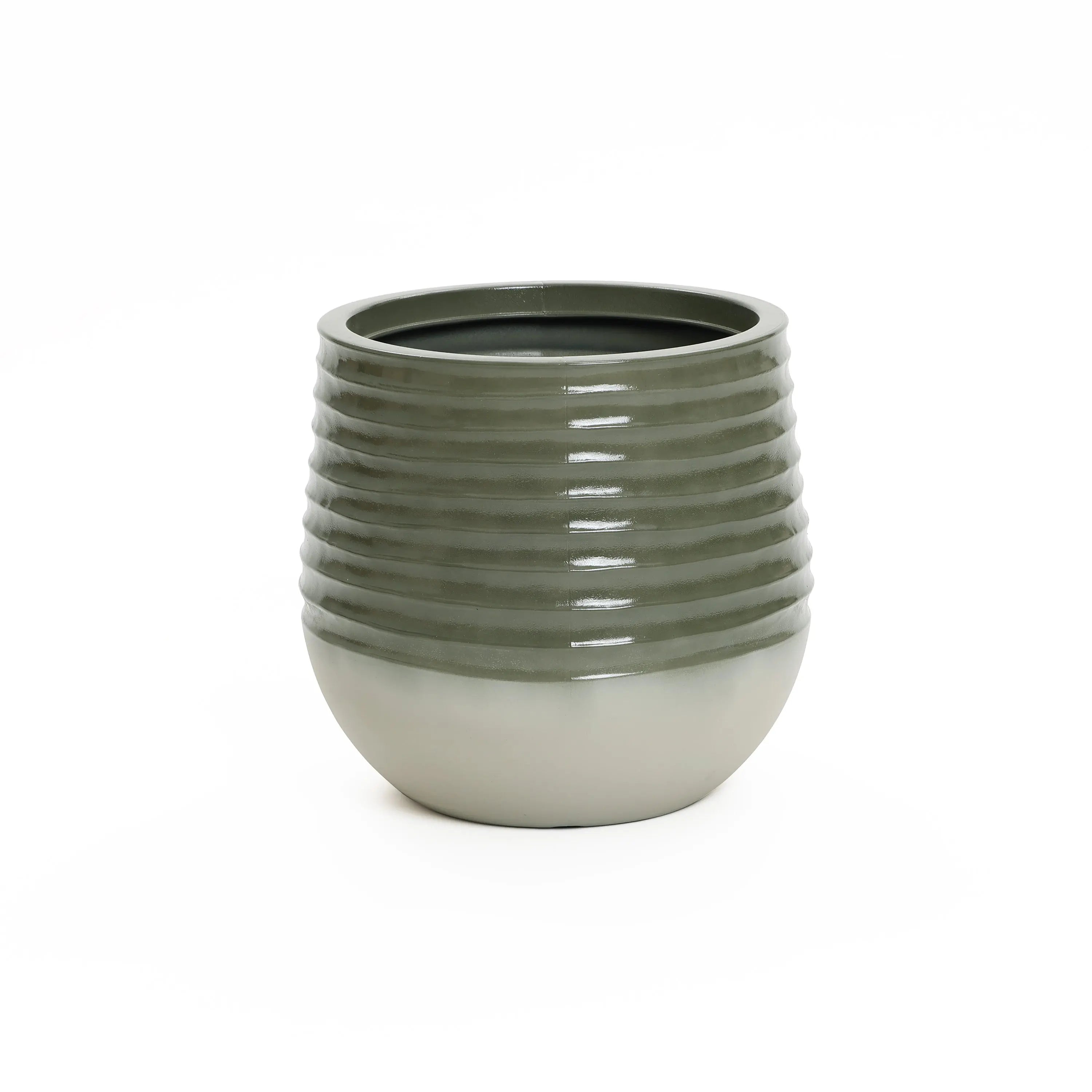 A round, green, ribbed ceramic planter with a glossy finish and a drainage hole tapers elegantly towards the base. Perfect for indoor and outdoor environments, it sits empty against a white background, ready for your creative touch.