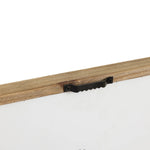 Close-up of the back of a picture frame with a metal sawtooth hanger, offering sleek functionality for modern home decor and readiness for wall mounting.