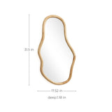 Irregularly shaped mirror with a thick, natural pine wood frame makes a stunning decorative statement. It measures 31.5 inches in height, 17.52 inches in width, and 1.18 inches in depth for an elegant addition to any room.