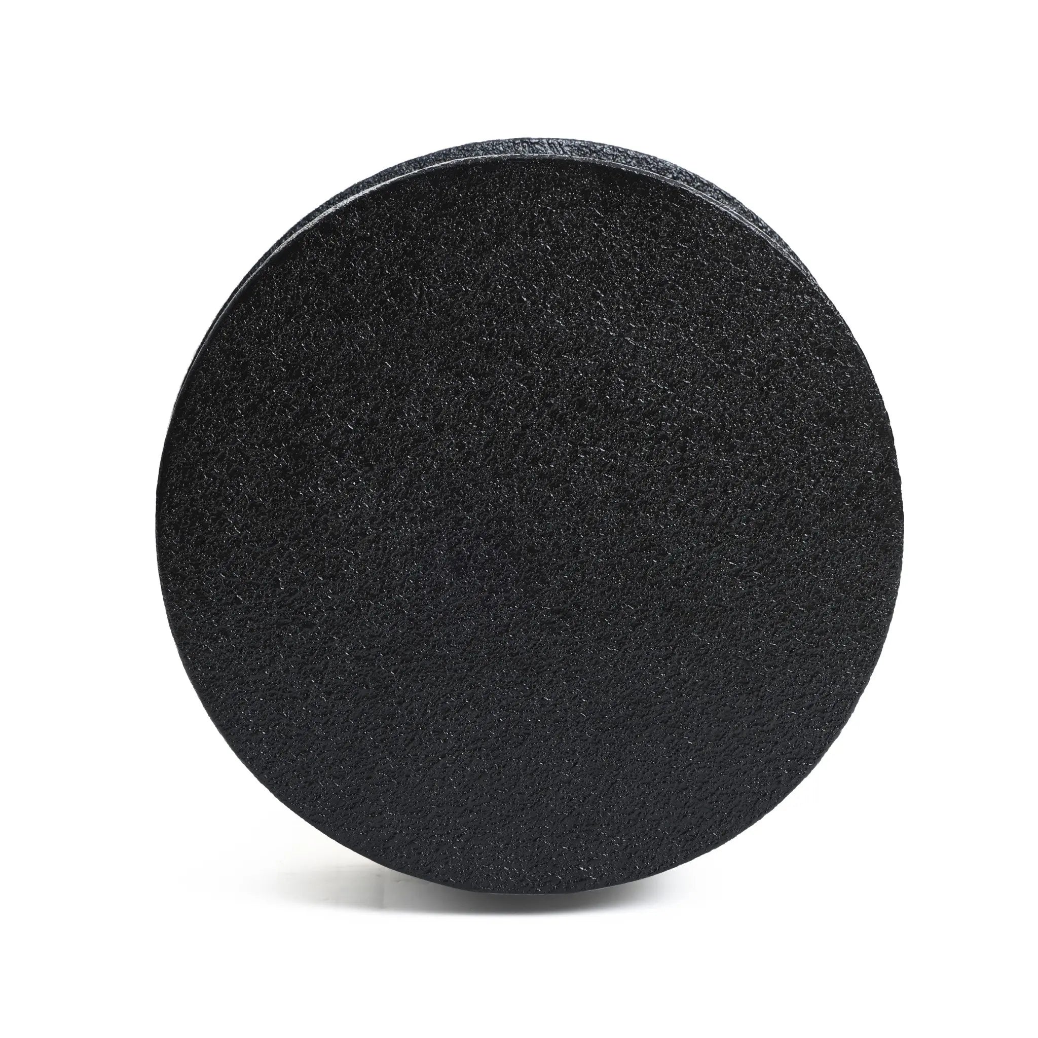 A black textured foam roller with a modern minimalist design stands upright against a white background, showcasing its unique white irregular pattern.