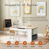 Activity Children Table with Storage Bookcase and 2 Chairs Set featuring adjustable height tabletop, built-in storage shelves, paint pot holders, paper clamps, and under-table storage area. White and natural wood finish table set shown in children's room with decorative wall art and round rug.