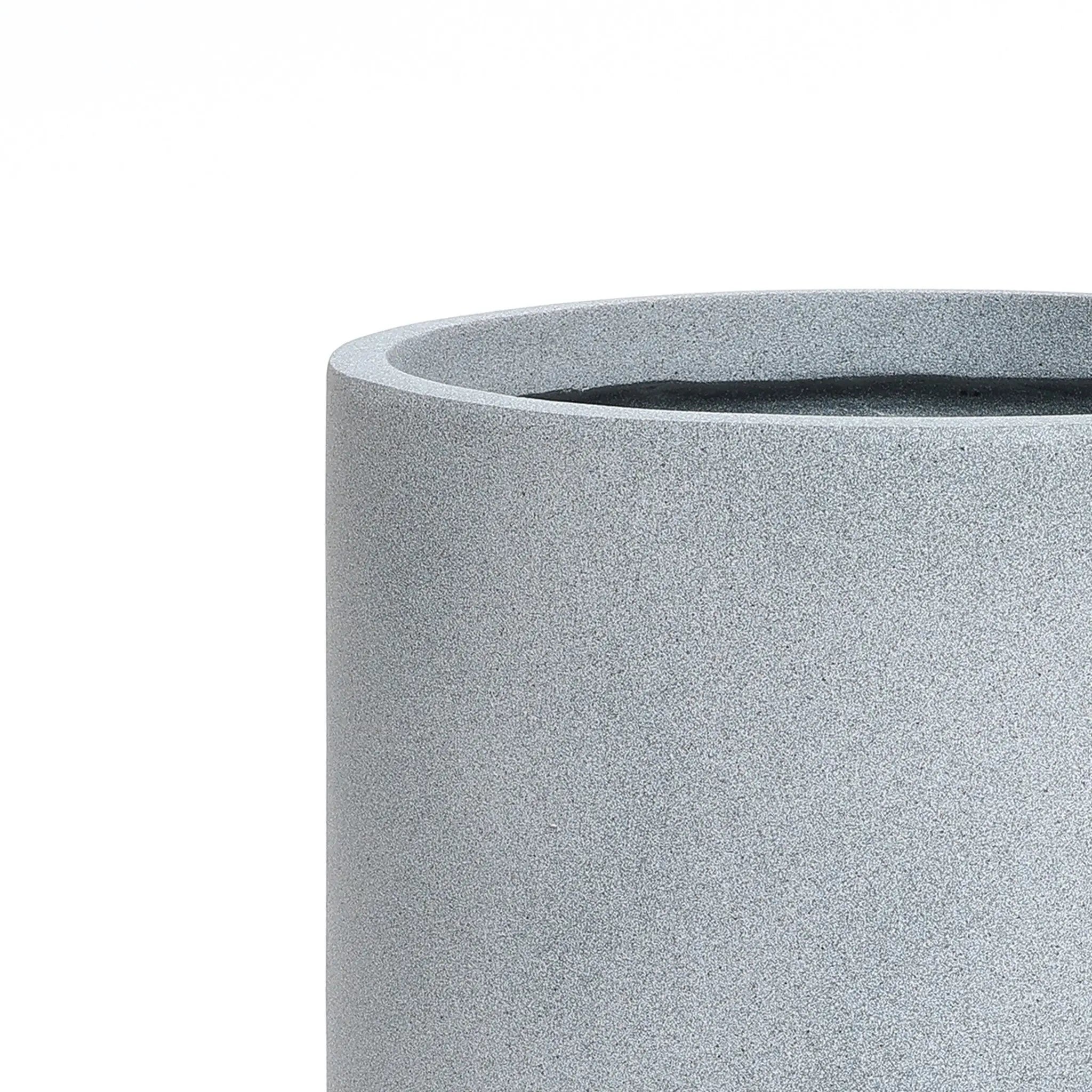 A modern minimalist gray cylindrical stone planter with a smooth, textured surface, perfect for indoor and outdoor decor, set against a plain white background.