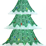 Close-up of a decorative Christmas tree adorned with colorful LED lights and a green netting, complemented by white trim resembling snow, perfect for holiday decor.