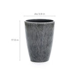 A LuxenHome Sea Gray Ripples glazed ceramic planter stands 17 inches tall, featuring a textured black and white vertical stripe design with a 12.8-inch diameter.