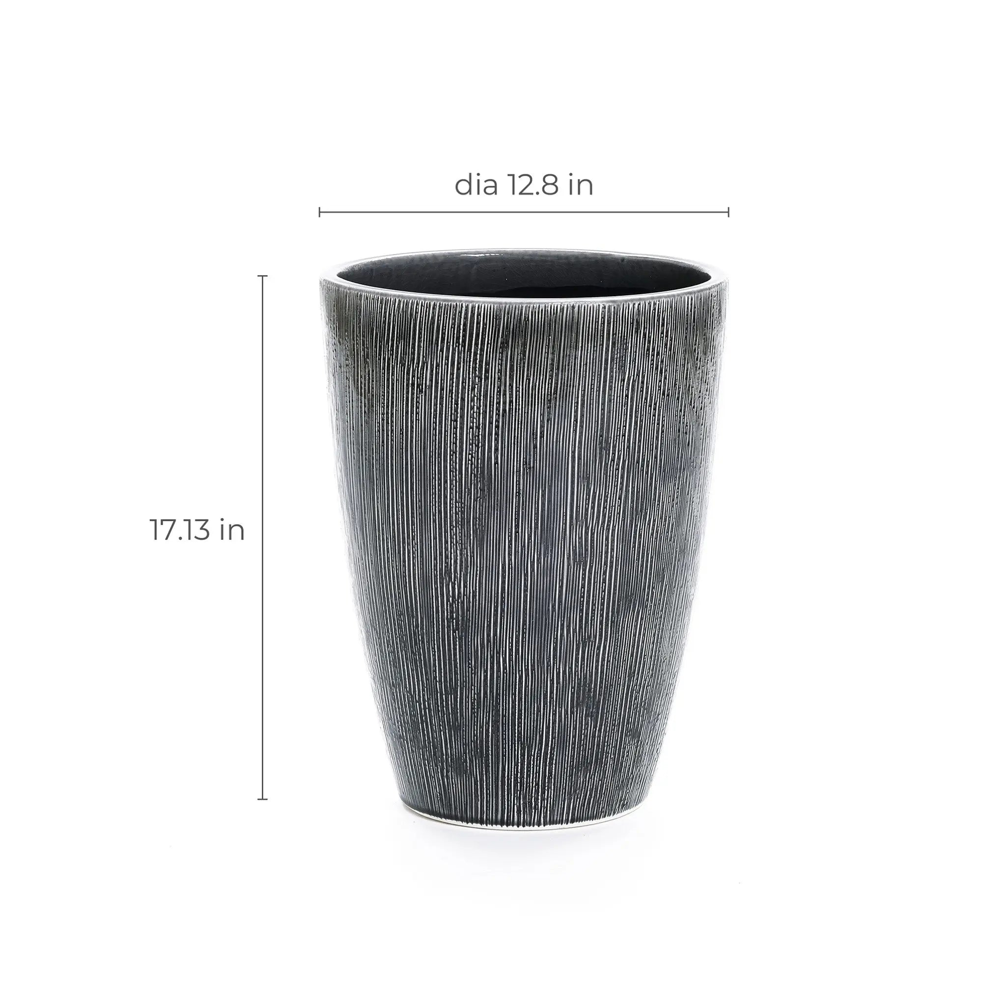 A LuxenHome Sea Gray Ripples glazed ceramic planter stands 17 inches tall, featuring a textured black and white vertical stripe design with a 12.8-inch diameter.