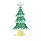 A decorative Christmas tree with a star topper, green branches, white trimming, and vibrant LED lights on a wooden base is the perfect holiday decor.