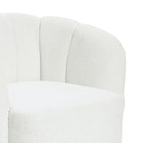 The LuxenHome Amber ivory boucle swivel barrel accent chair showcases a plush, modern design with a rounded backrest and soft, textured upholstery in ivory boucle. Its gentle curves and minimalist style make it perfect for contemporary spaces.