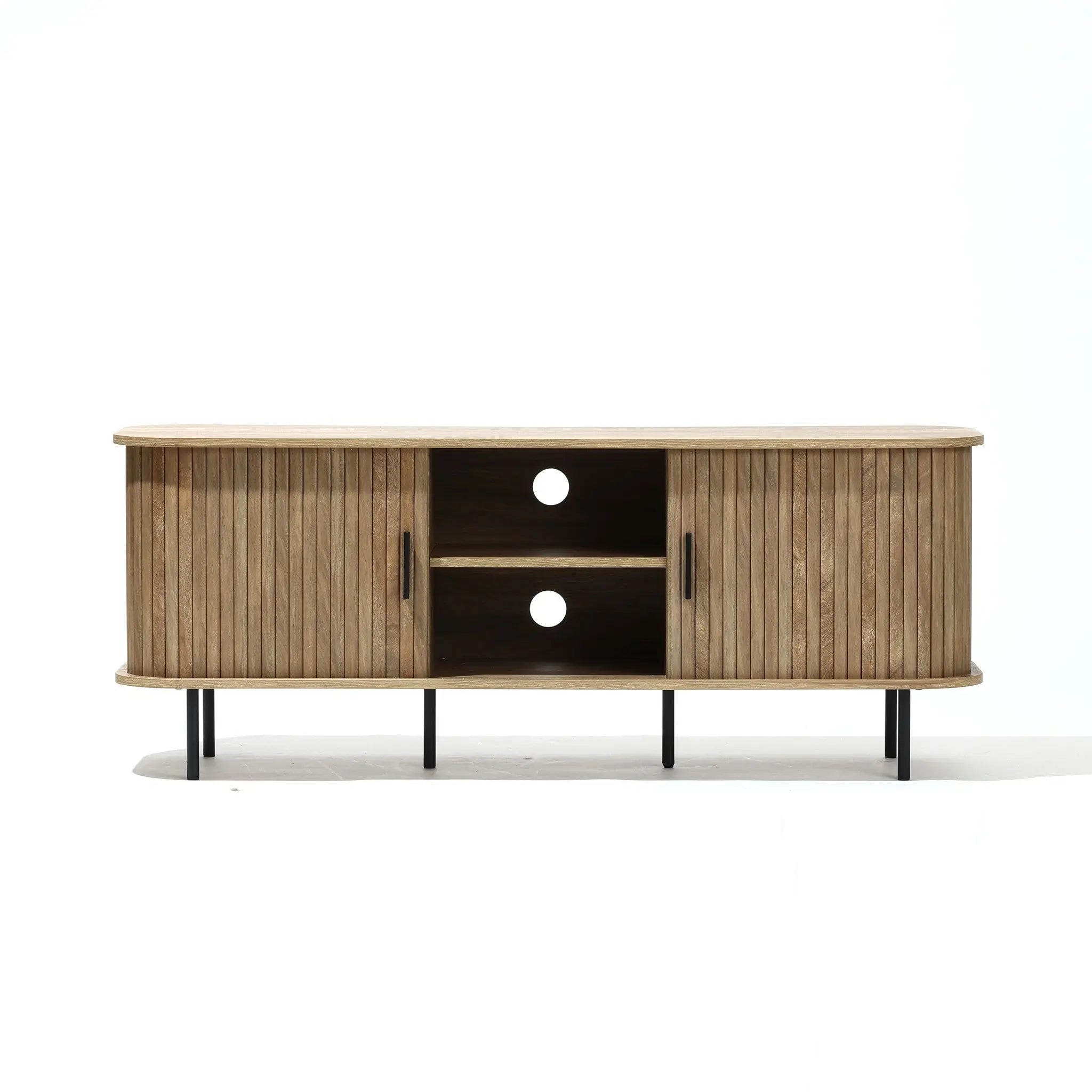The Aria oak finish TV stand by LuxenHome features a mid-century modern design with two cabinets having vertical grooves, central open shelves with cable cut-outs, and is supported by sleek black metal legs. Its suitable for TVs up to 55 inches wide.