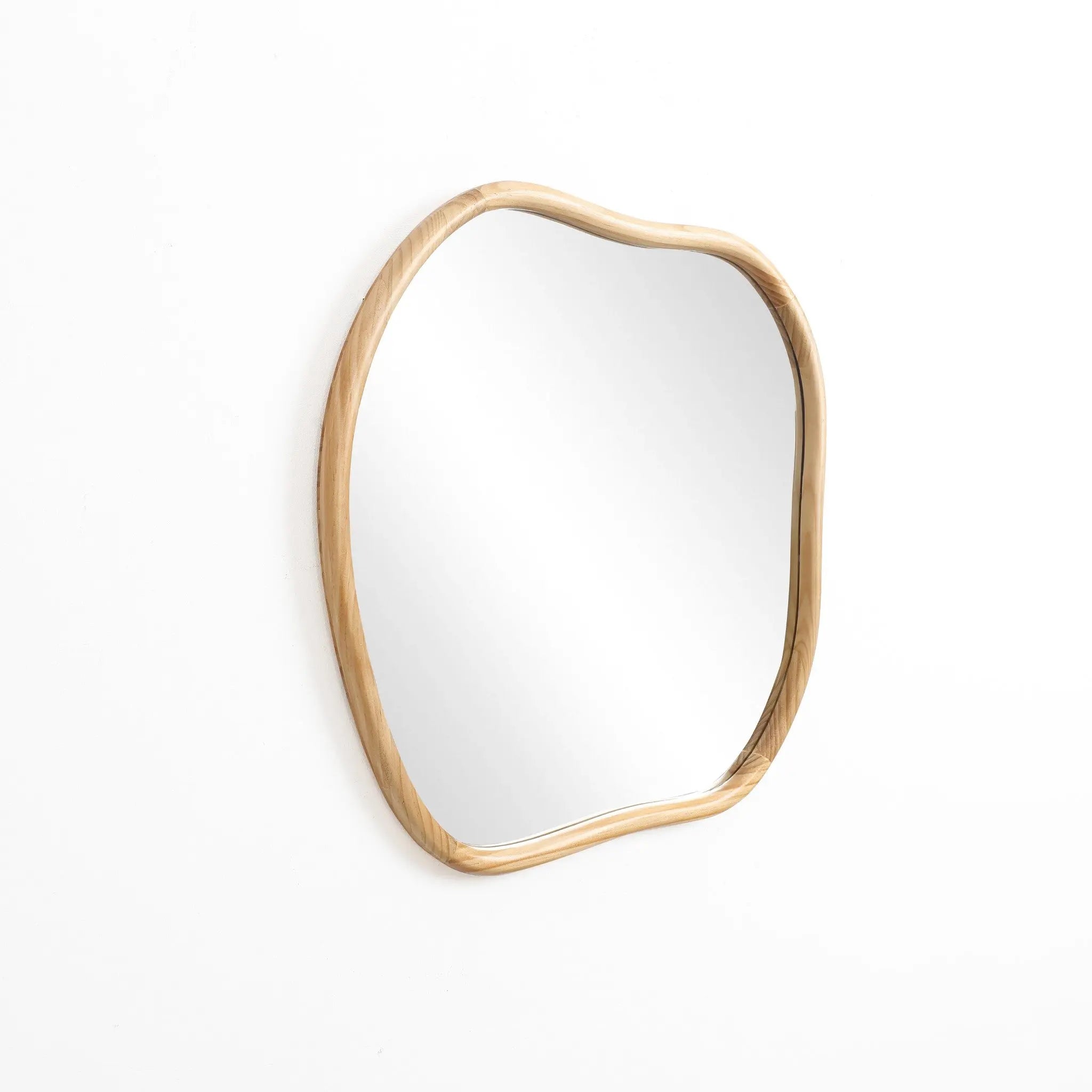 Irregular-shaped wall mirror with a natural pine frame, elegantly mounted on a white wall, perfect for enhancing your home decoration.