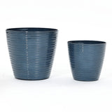 Two blue striped ceramic decorative planters, one larger and one smaller, placed side by side on a white background. These stylish pieces feature a UV-protected finish, making them perfect for both indoor and outdoor use.
