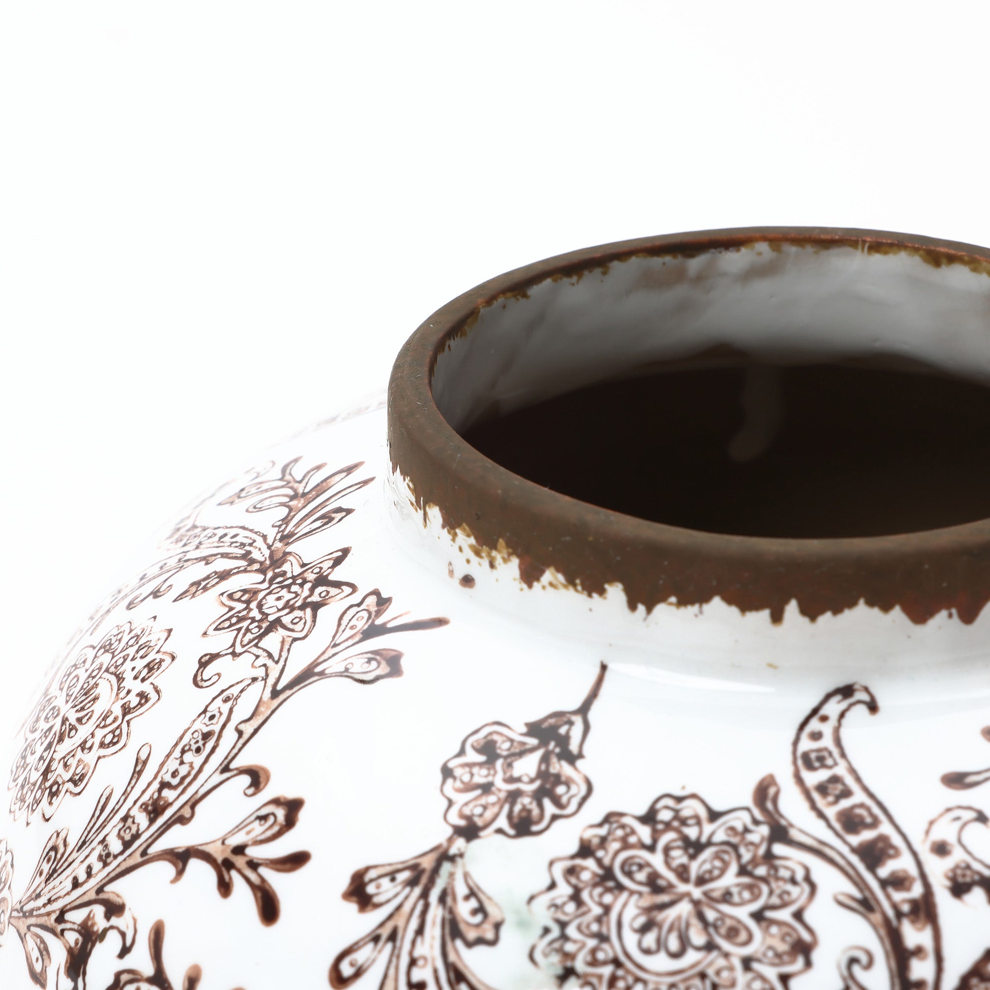 Close-up of the top part of an elegant vase with brown floral patterns and a worn, dark brown rim.