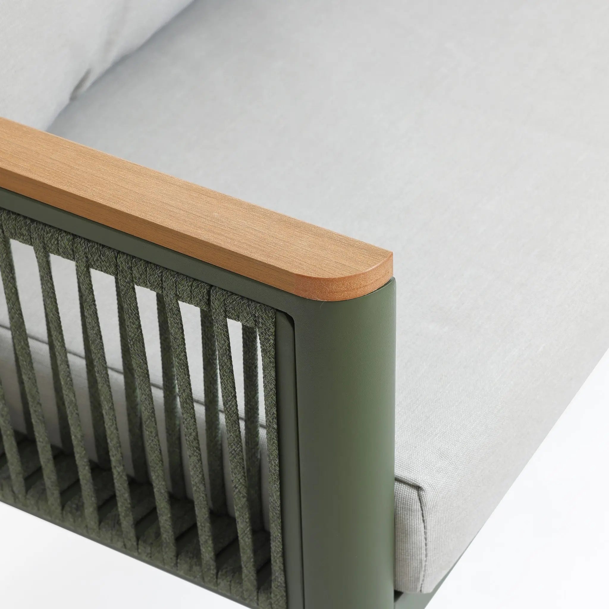 Close-up of a modern chair with a durable aluminum alloy frame and light gray plush cushion, featuring wooden armrests. The design includes woven details on the sides.