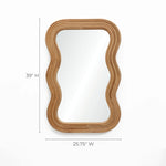 This rectangular wall mirror, featuring a wavy cork wood frame, exudes a modern vibe with dimensions of 39 H and 25.75 W.