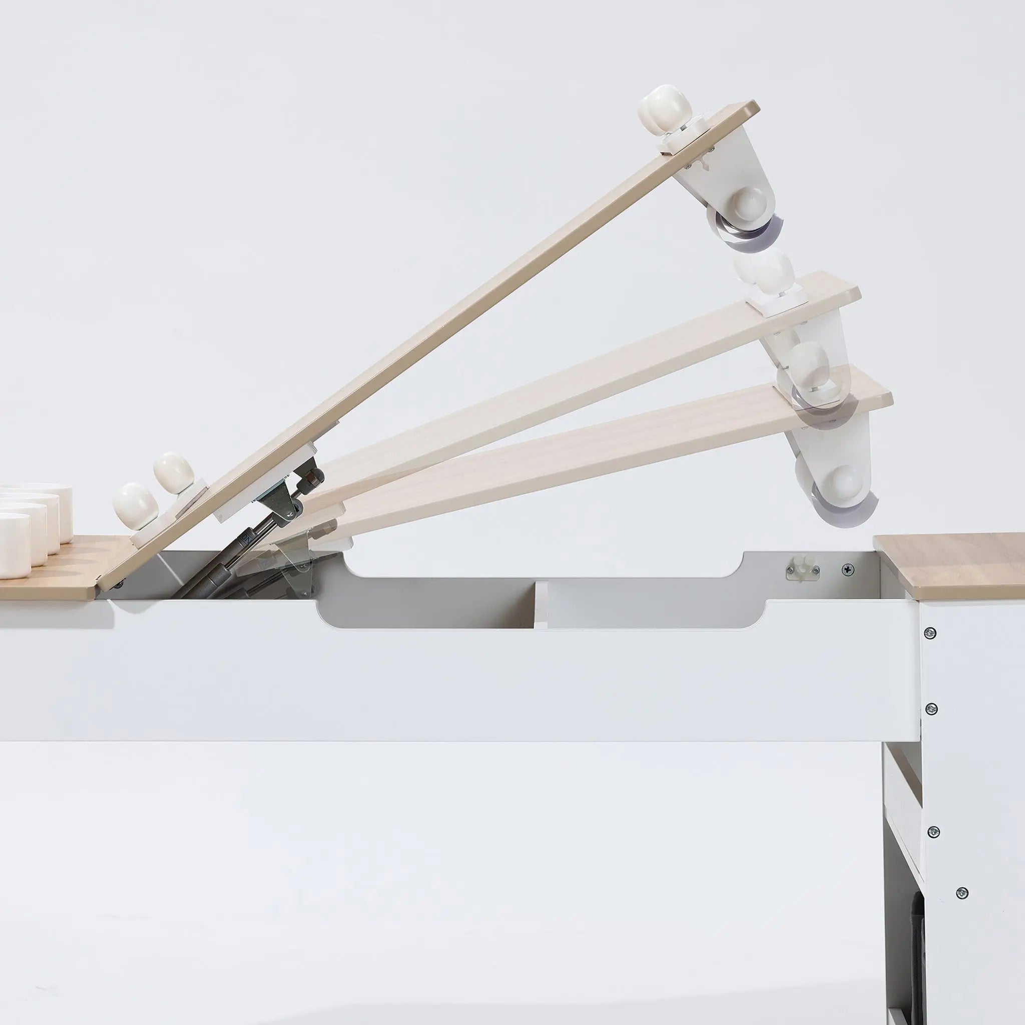 The LuxenHome Activity Children Table with Storage Bookcase and 2 Chairs Set features a versatile mechanical system with wooden panels and white wheels on a metal frame, perfect for creative projects. The adjustable design allows panels to shift positions, adding versatility to any build.