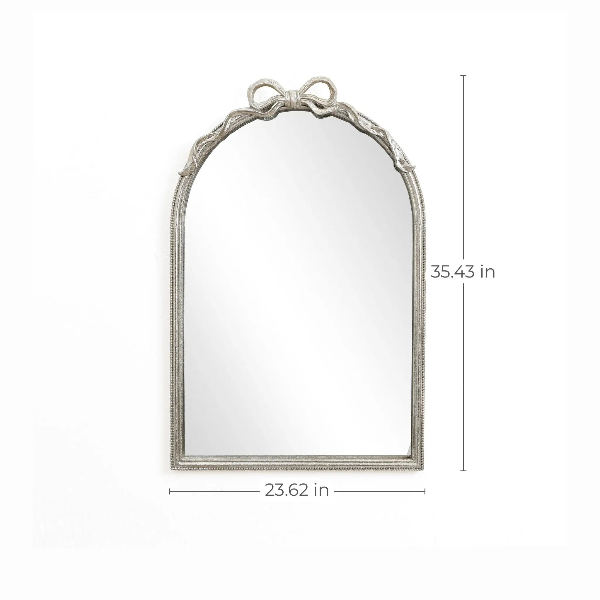 The Ribbon Wall Mirror features an arched silhouette with a decorative top, embodying a modern romantic style. Its dimensions are 35.43 inches high and 23.62 inches wide, adding elegance to any space.