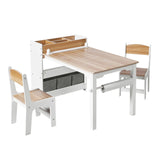 Ideal for a playroom or study area, the LuxenHome Children Play Table with Bookcase and 2 Chairs set features a light wood table top with a white frame, organizer compartments, and storage underneath. The matching chairs have white frames and wooden seats, perfect for studying or arts and crafts.