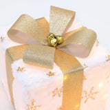 Gold-Ribbon-and-bow-for-Christmas-Snowflake-gift-box