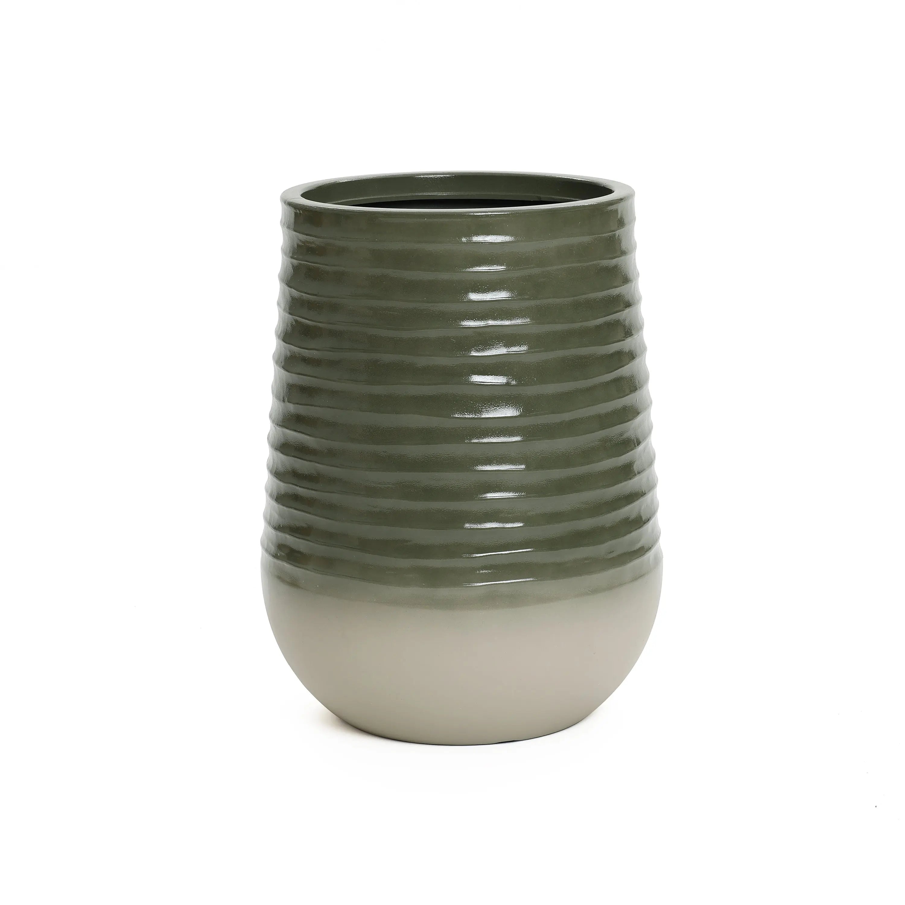 This green and beige ceramic planter features a ribbed texture, tapering slightly at the top. Perfect for indoor and outdoor environments, it adds charm to any space.