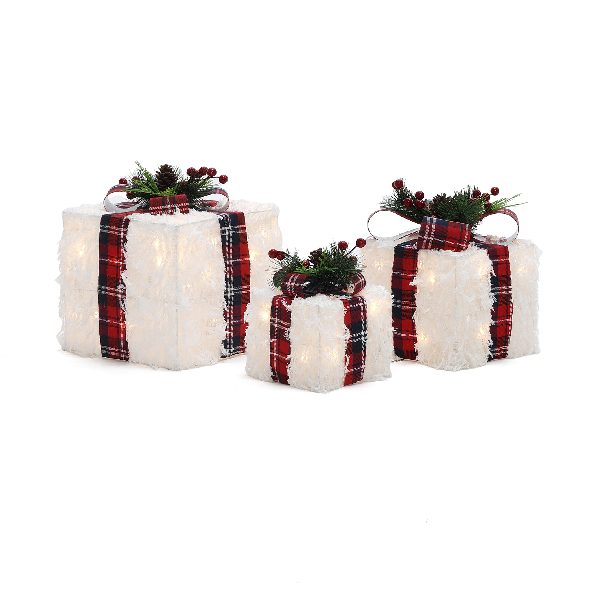 3 white, fluffy, light-up gift boxes with red plaid ribbons, pine sprigs, berries, pinecones on top.