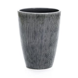 The LuxenHome Sea Gray Ripples Glazed Tall Ceramic Planter stands 17 high, showcasing an elegant design with a wood grain-like textured surface and vertical black-and-white stripes for a modern flair against its plain white background.