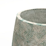 The LuxenHome Rustic Multi-Color Cement 18.3-Inch Round Planter features a textured, cylindrical design with greenish markings and a smooth top edge, making it a standout piece against a plain white background for those seeking unique decor.
