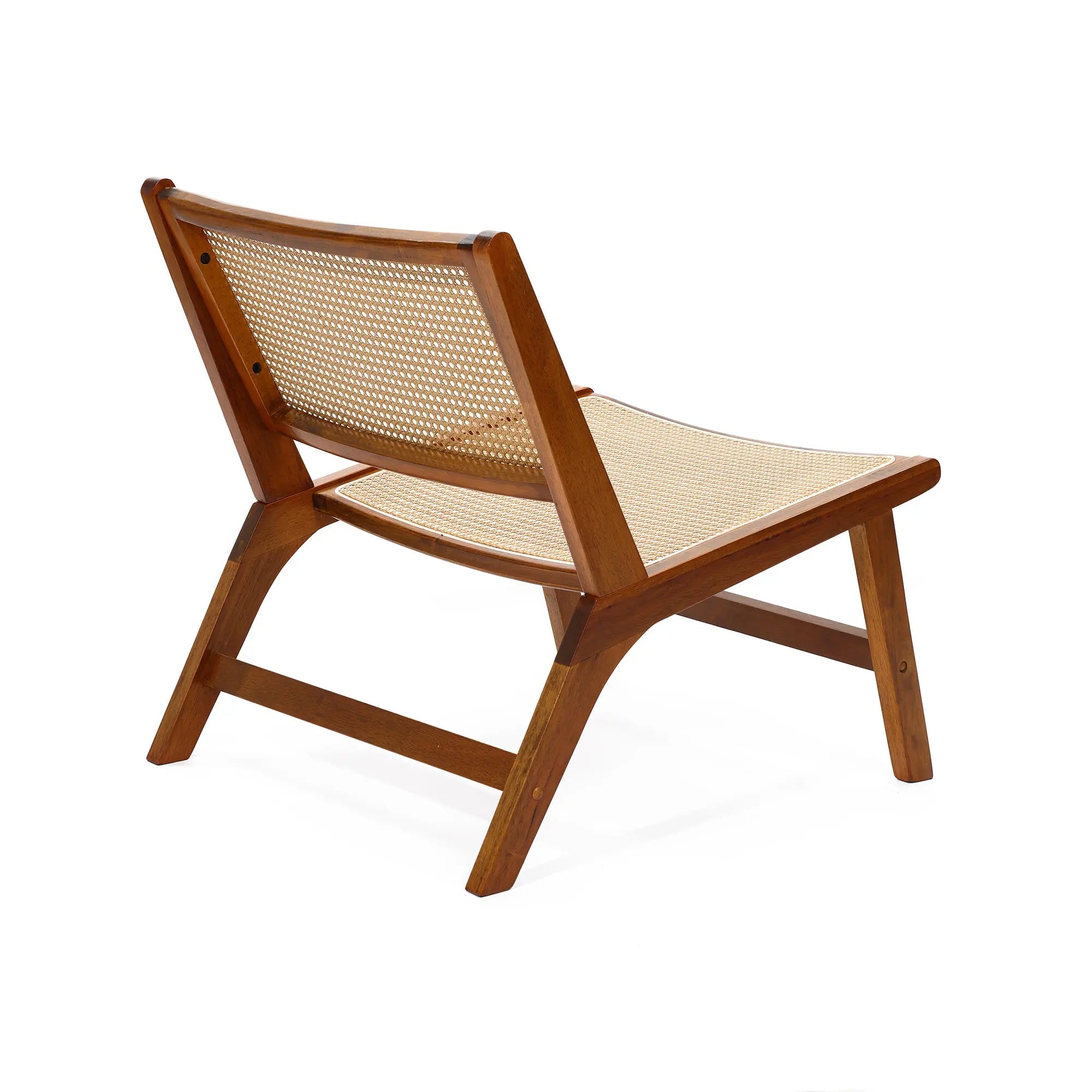 A mid-century modern wooden lounge chair with a woven cane backrest and seat, viewed from a rear angle, perfect as an indoor accent chair.