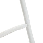 Close-up of a rustic charm blanket ladder made from white fir wood, showcasing two intersecting rungs against a white background.