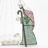 A lit wire-frame nativity scene featuring a shepherd with a staff and a baby in a manger, illuminated by LED bulbs, makes for an enchanting Christmas decoration. Complete with the guiding presence of the North Star, it captures the essence of this cherished holiday tradition.
