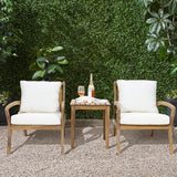 two-chairs-and-a-table-in-a-garden-setting